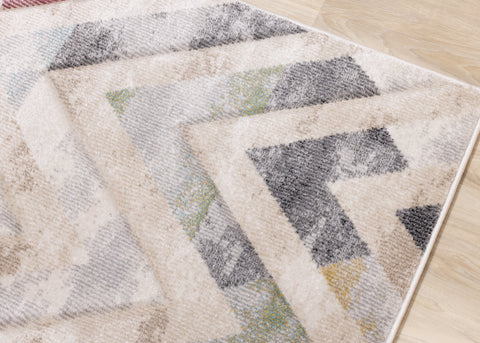 Folio Cream Grey Blue Pink Yellow Distressed Carved Chevron Rug by Kalora Interiors