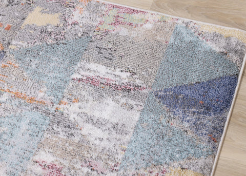 Fresco Distressed Grey Pink Blue Yellow Triangular Pattern Rug by Kalora Interiors