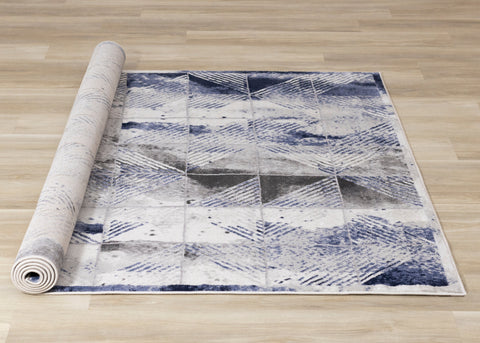 Chorus Grey Blue White Distressed Triangle Grid Rug by Kalora Interiors