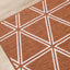 Bristol Orange White Geometric Triangle Rug by Kalora Interiors
