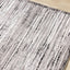 Chorus Black Grey White Iridescent Plush Rug by Kalora Interiors