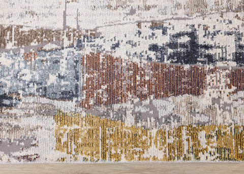Evora Cream Blue Red Yellow Opposing Triangles Distressed Rug by Kalora Interiors