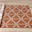 Bristol Orange White Geometric Triangle Rug by Kalora Interiors